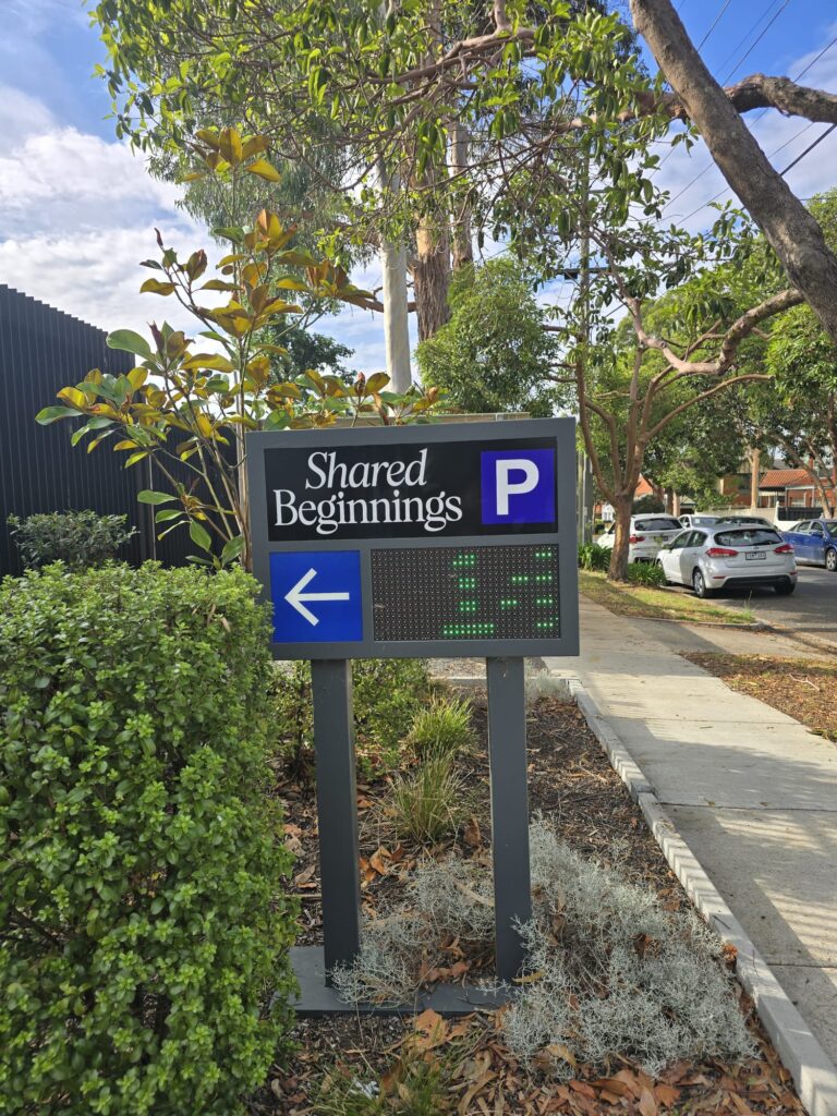 Directional parking signage for Shared Beginnings early learning centre