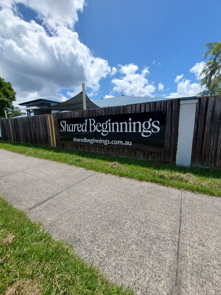 Shared Beginnings childcare fence signage installed at an early learning centre